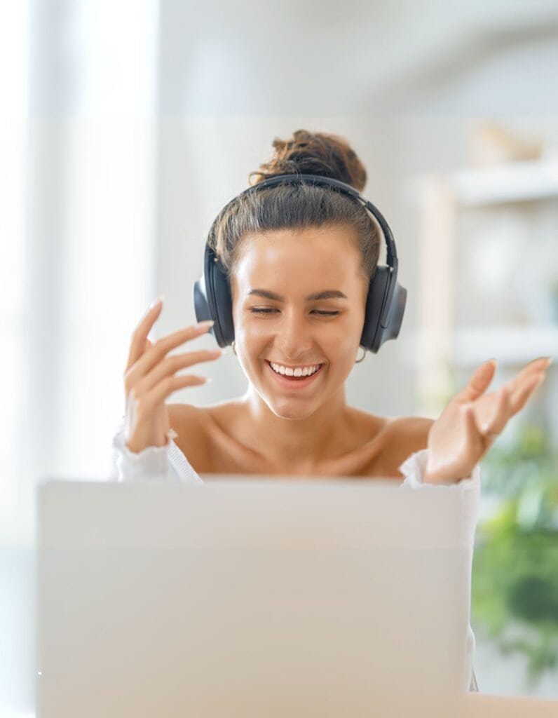 Online voice teacher coaching a young student over video call