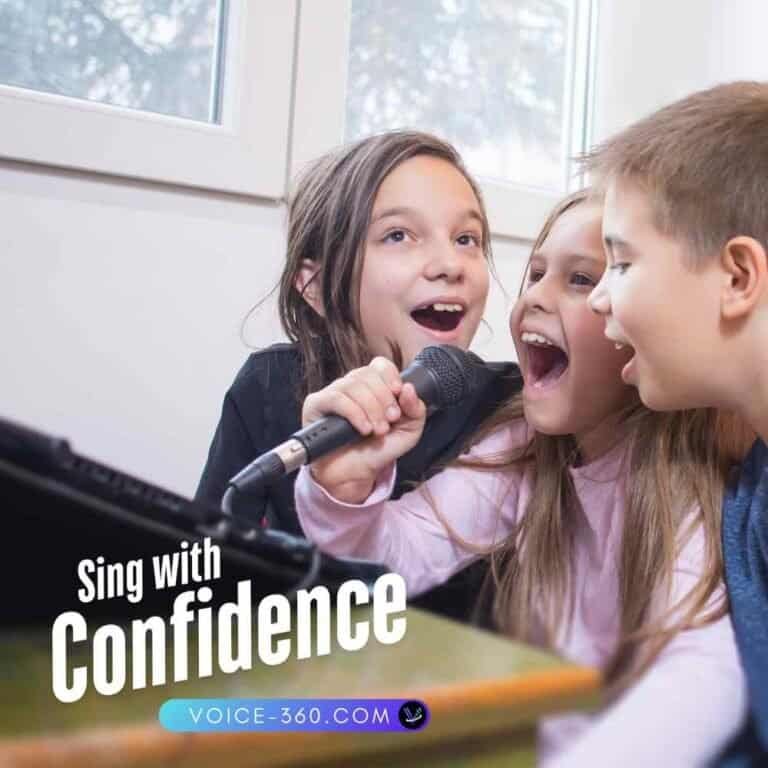 Three homeschool children singing together into a microphone with joy